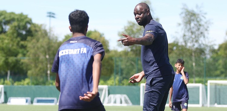 Ledley reunited with Kickstart FC during Training Centre visit